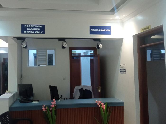 The reception, cashier and registration desk at A.S.E. Dorothea Mission Hospital, with the triage room alongside